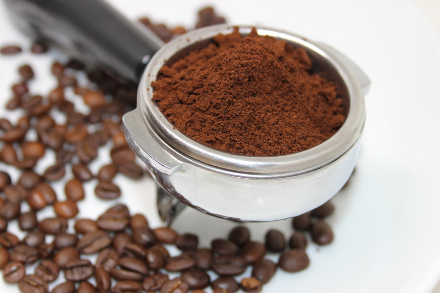 A close-up image of coffee grounds
