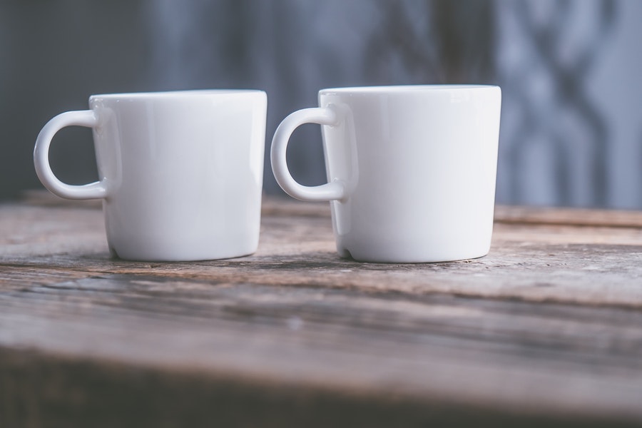 Two white coffee mugs
