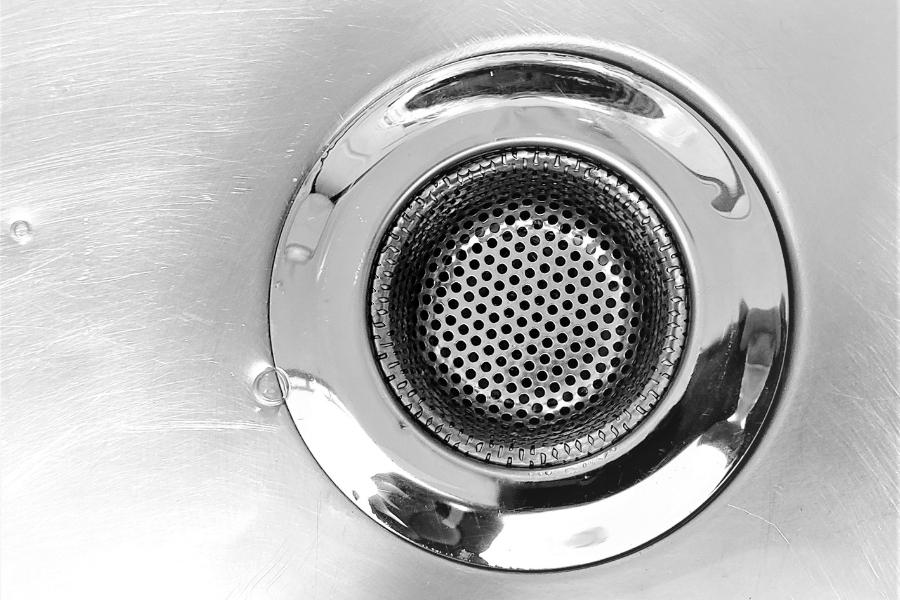 A close-up image of a sink drain