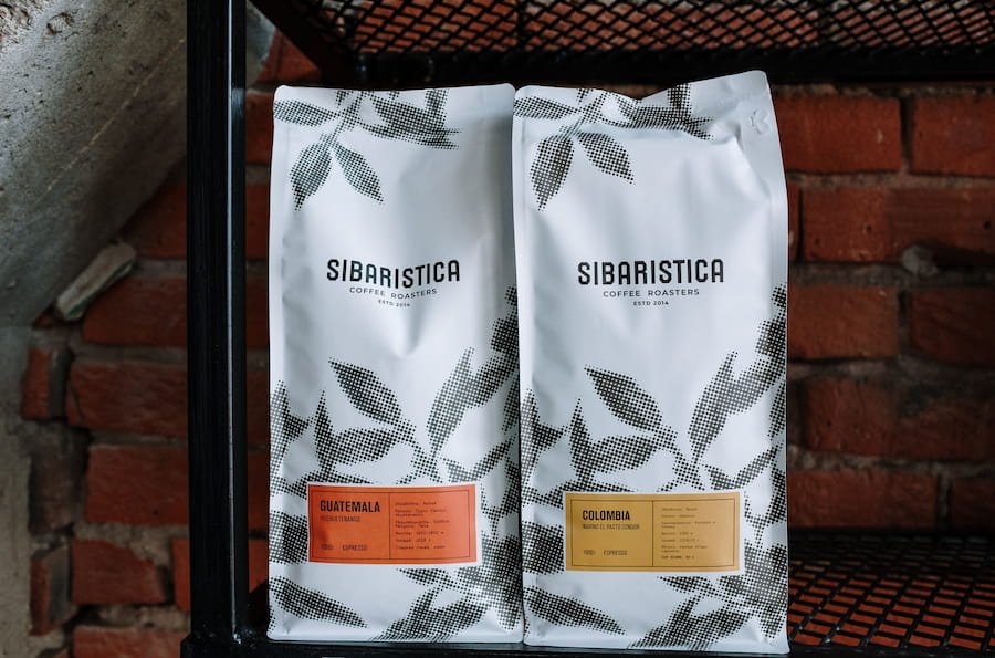 An image of two kinds of coffee beans in a bag