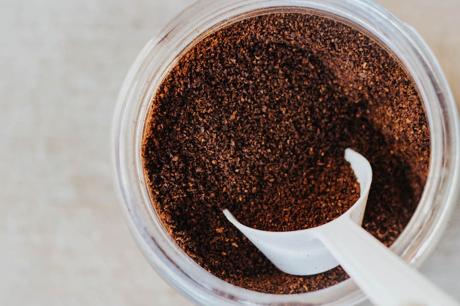 An image of coffee grounds in a container