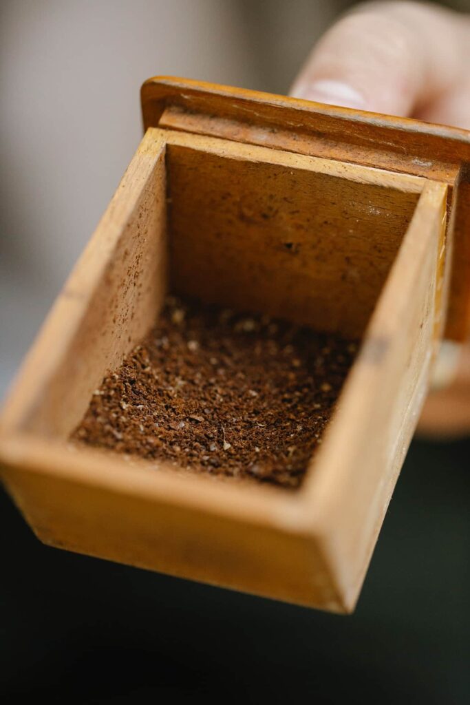 An image of coffee grounds in a box