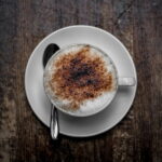 An image of a cup of foamy cappuccino